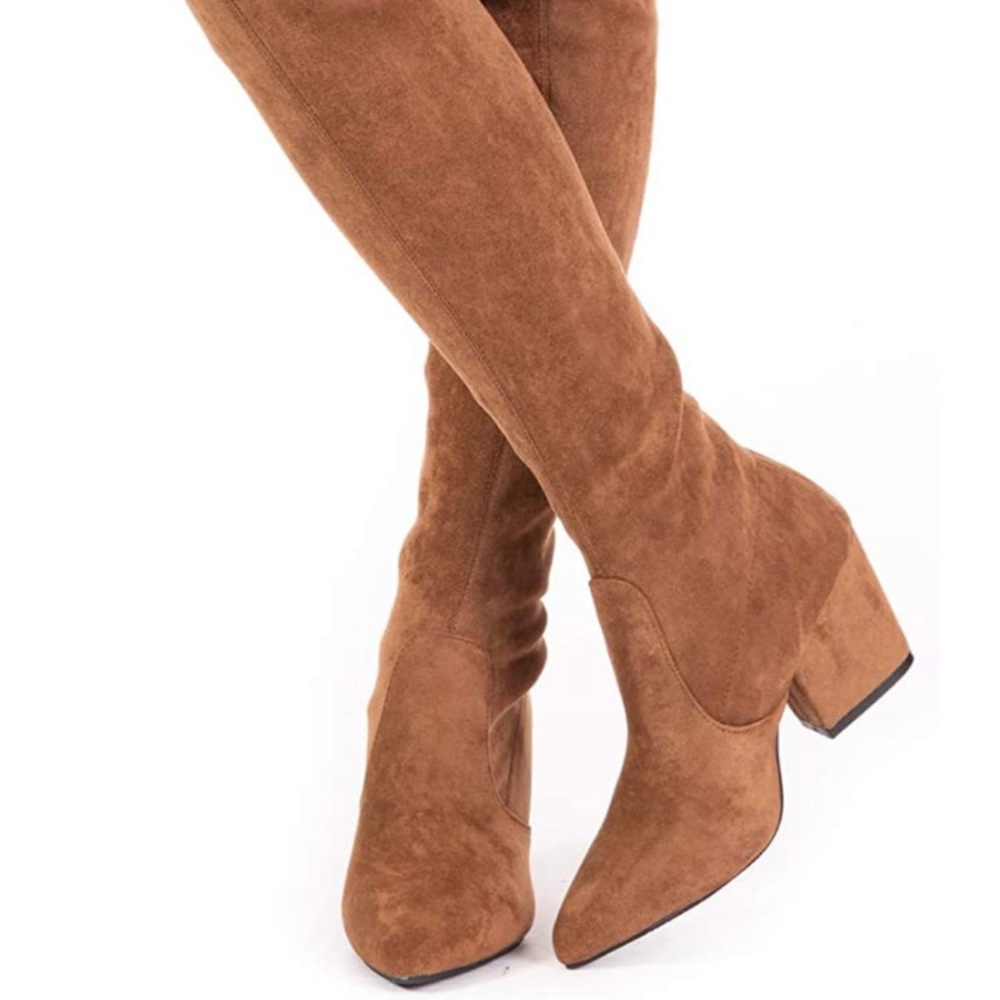 NWOT knee high boots.